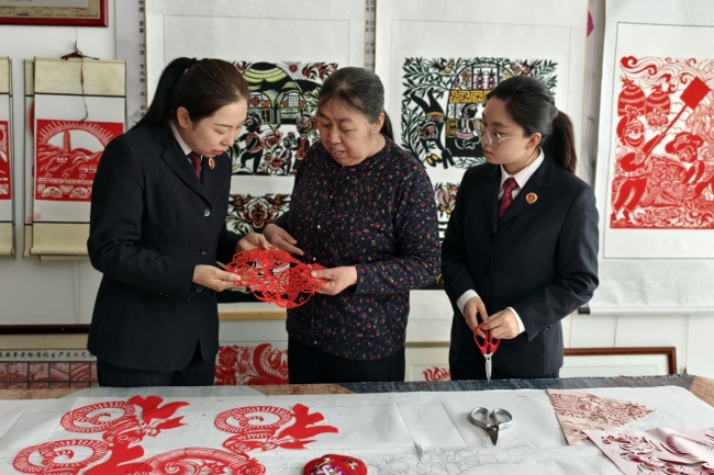 一体学思践悟习近平法治思想、习近平文化思想|跨越时空的“剪纸保卫战”